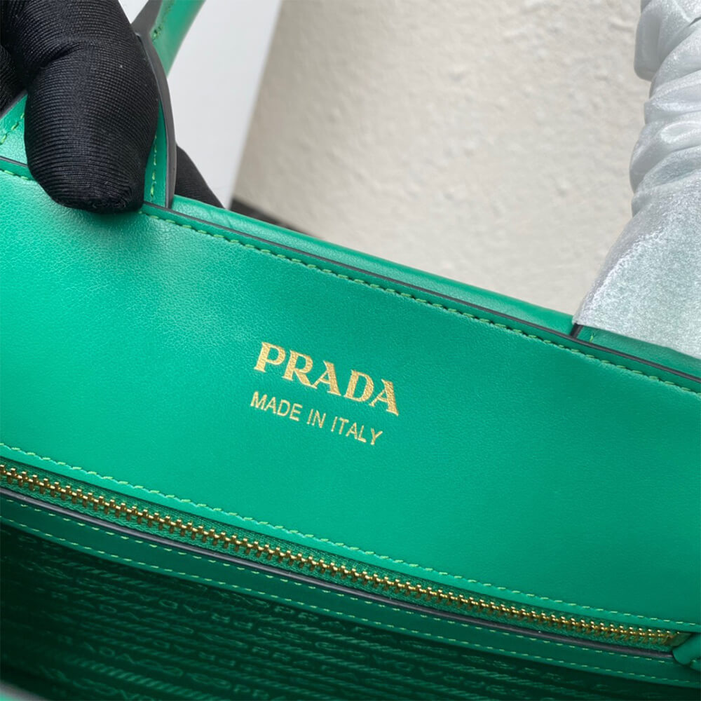small leather Pra*a symbole bag with topstitching